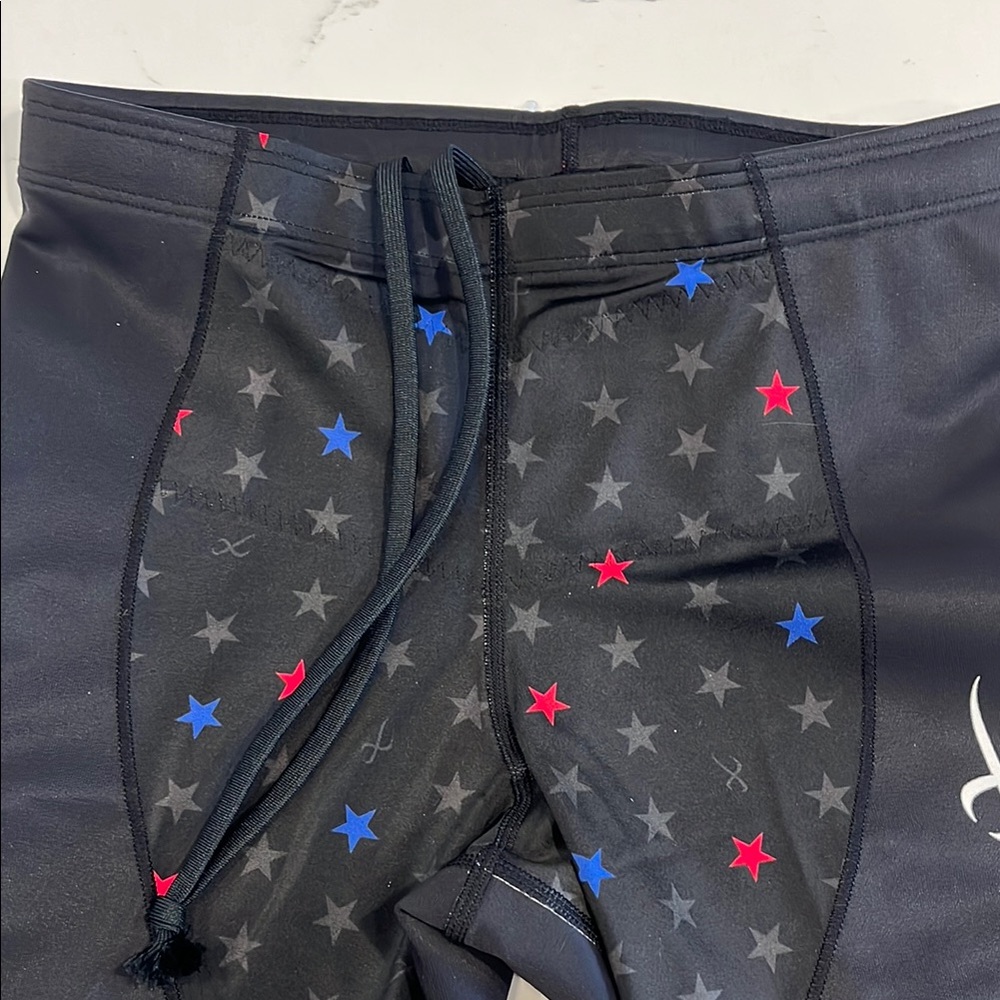 CW-X Men's Black Compression Shorts with Red & Blue Star Accents - Picture 4 of 10